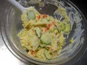 Add Sliced cucumber,sliced apple,salad dressing, mayonnaise and mix