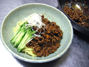 Make meat miso and cook it on boiled noodles and garnish cucumbers and very thinly julienned Japanese leek